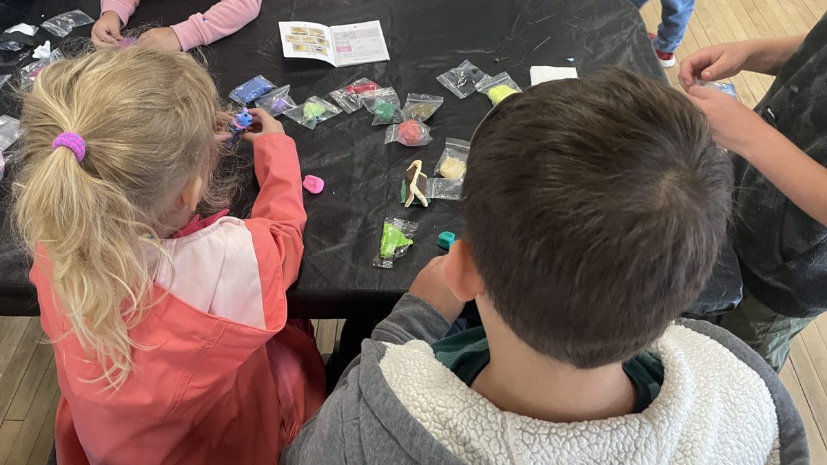 Children playing with clay arts at Craft Day 2025