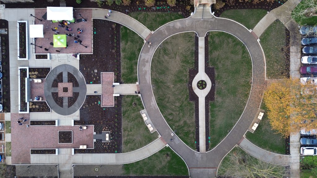 Aerial view of completed plaza and garden, taken early December 2025.